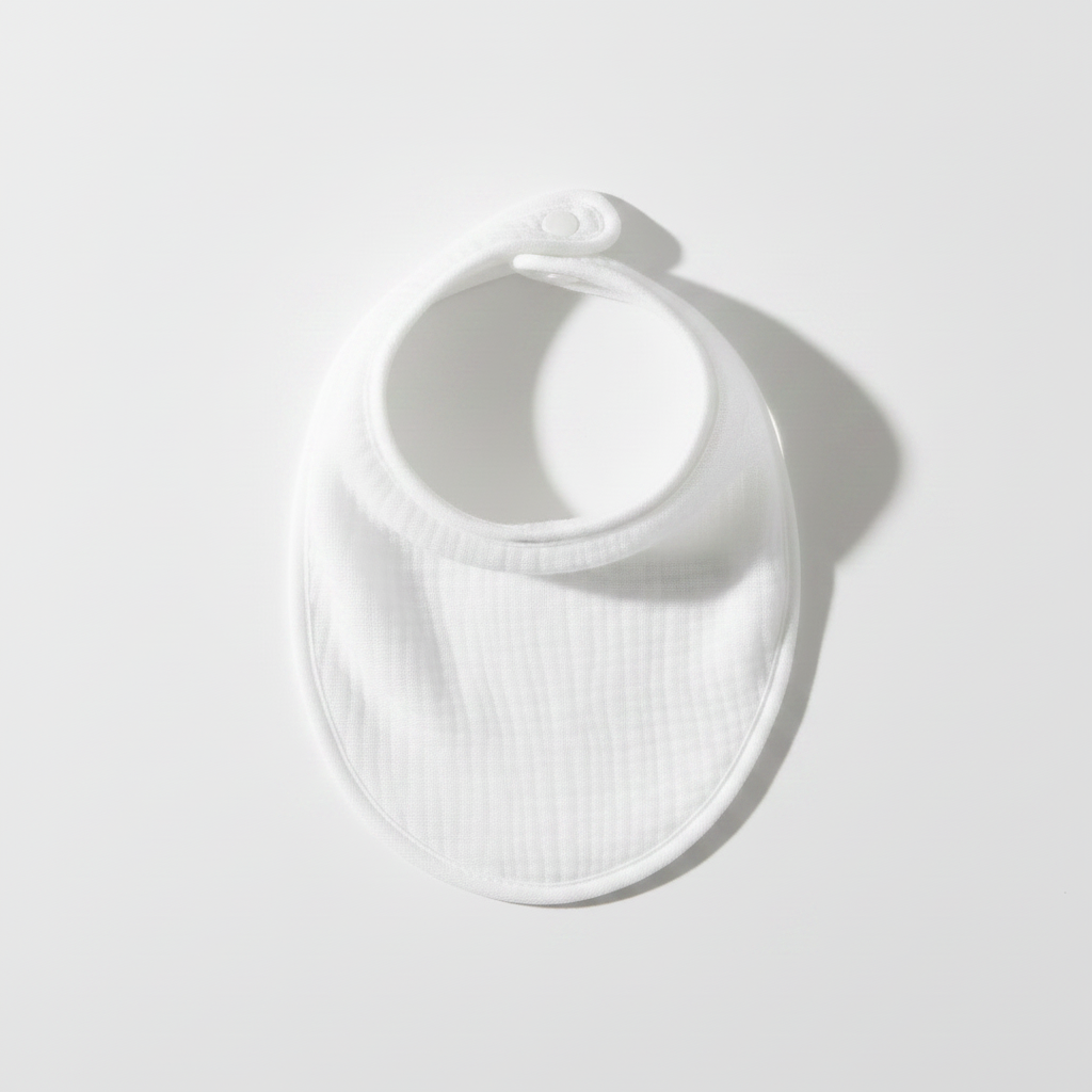 bavoir doux en mousseline blanc